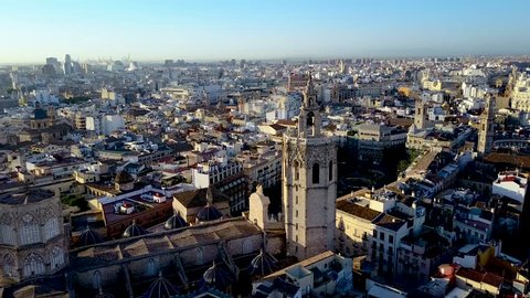 Valencia Spain aerial footage slowly panning around the Miguelet Bell Tower and Cathedral.