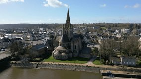 Basilica of Notre-Dame d'Avesnières, Laval in France. Aerial drone ascending