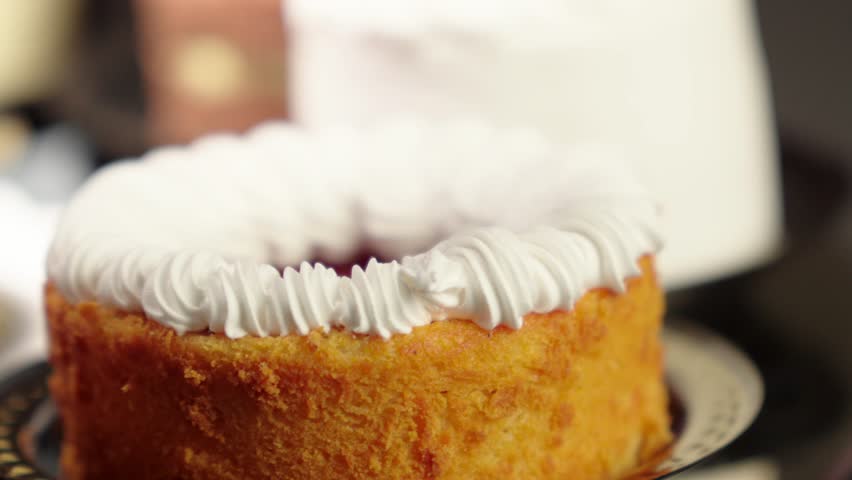 detail closeup macro of several mini cakes Small cakes petit turn table dessert table spinning cheesecake chocolate moka strawberry cheese butter
