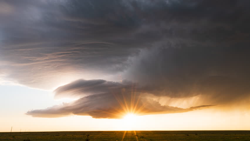 Backlit supercell slowly traverses the plains of Texas.