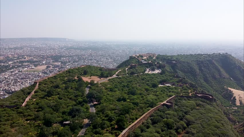 Royal Nahargarh fort over Jaipur city on top of Aravalli hills secured by castle walls in Rajasthan India