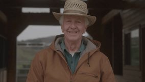 Smiling farmer on a farm, stock video