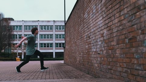 Super slow motion free running acrobat in street shot on Phantom Flex 4K