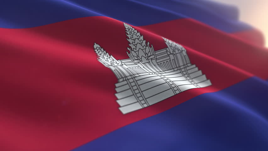 Fluttering the national state flag ensign of Cambodia. Cambodia national flag shaken by the strong wind. Cambodia national flag with a white temple in the centre of horizontal stripes.