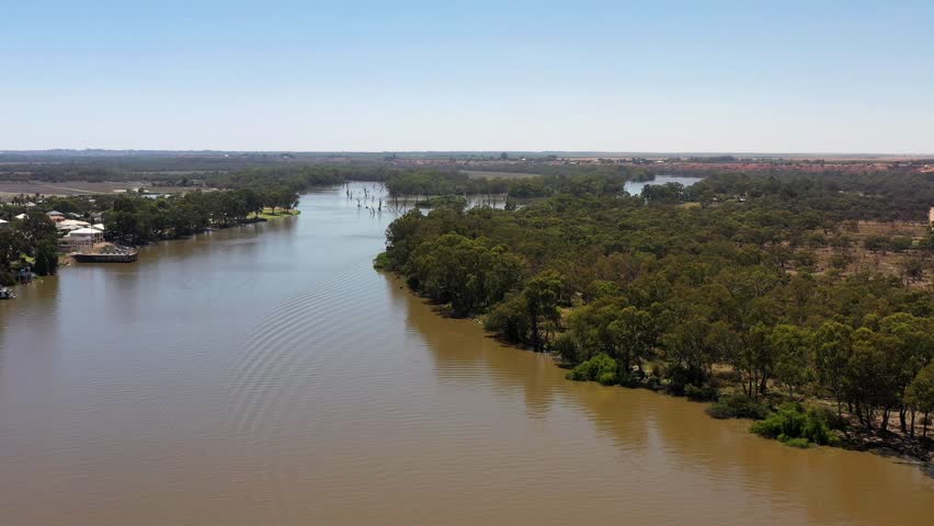 Mighty lazy flow of fresh waters in stream of Murray river at Renmark, South Australia.

