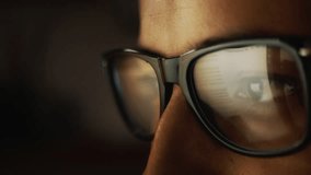 In the reflection of glasses on a male face, he is surfing the Internet and a pie digital chart showing one hundred percent loading. Cg - Powered by Shutterstock - Get 15% off with code: PIKWIZARD15