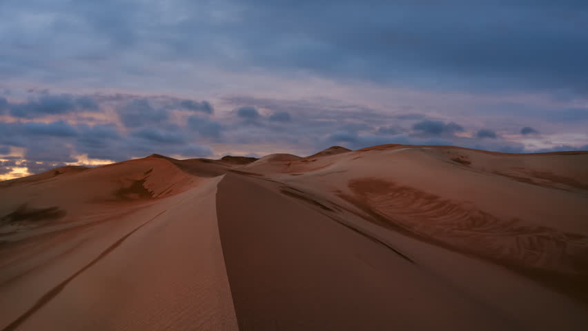 Timelapse of sunset over the sand dunes in the desert. Death Valley