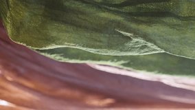 Vertical video footage of selling fabrics at an oriental street bazaar. Multi-colored fabrics are placed on the counter. - Powered by Shutterstock - Get 15% off with code: PIKWIZARD15