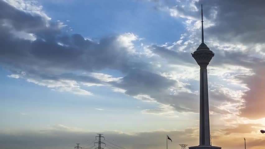 Time Lapse of Milad Tower in Tehran, IRAN - Time Lapse of The Road Opposite Milad Tower in Tehran, IRAN - Time Lapse of Milad Tower in Tehran, IRAN IN A CLOUDY DAY Royalty-Free Stock Footage #3469695727