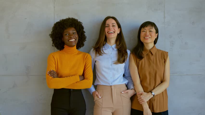 Female leader, manager and boss standing together as a team with a clear vision and mission for the growth and development of their company. Portrait of a group of business women in the office
