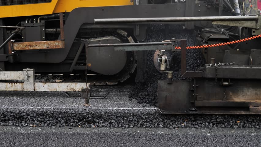 Asphalt paver unloads hot asphalt, bitumen onto road, asphalt laying. 3D Illustration Royalty-Free Stock Footage #3469817547