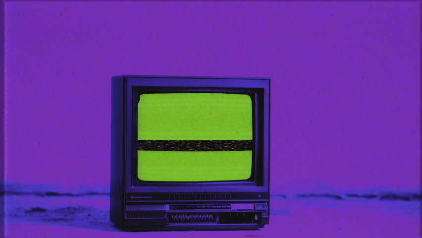 Vintage TV Green Screen Old School Retro VHS Texture Old Television  Zoom In. Old school television with green screen on the ground, zoom in. Old VHS effect, neon colors