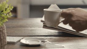 businessman reading newspaper at office - Powered by Shutterstock - Get 15% off with code: PIKWIZARD15