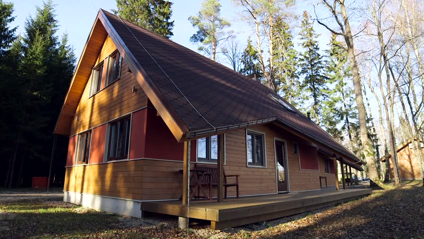 Tasteful, Newly Built Cottage Building in the Forest. In Modern Usage, a Cottage is Usually a Modest, Often Cosy Dwelling, Typically in a Rural or Semi-rural Location.