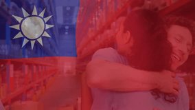 Animation of flag of taiwan over diverse male and female volunteers embracing in warehouse. Taiwanese, business, charity, economy and distribution, digitally generated video. - Powered by Shutterstock - Get 15% off with code: PIKWIZARD15