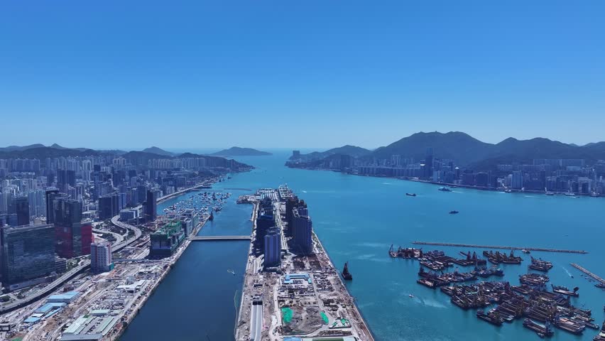 Kai Tak Construction Residential high-rise housing project along the seaside promenade near Victoria Harbour Hong Kong