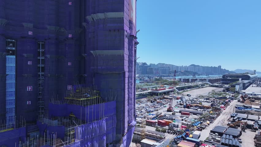 Kai Tak Construction Residential high-rise housing project along the seaside promenade near Victoria Harbour Hong Kong