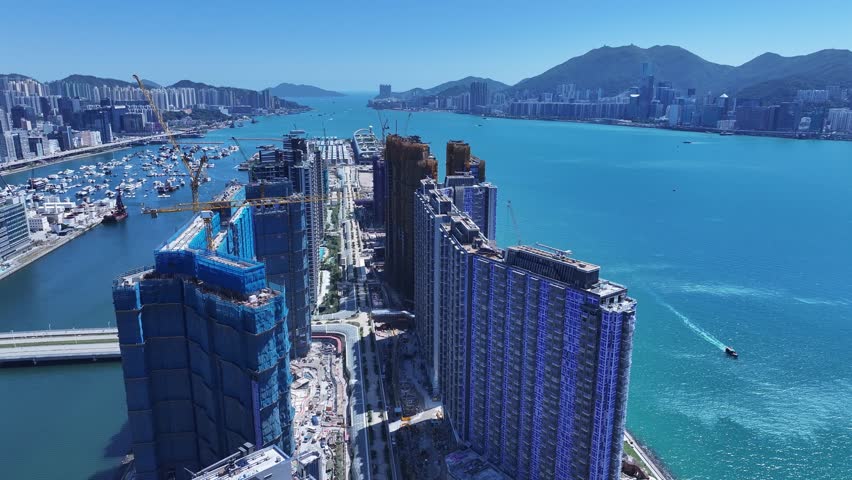 Kai Tak Construction Residential high-rise housing project along the seaside promenade near Victoria Harbour Hong Kong