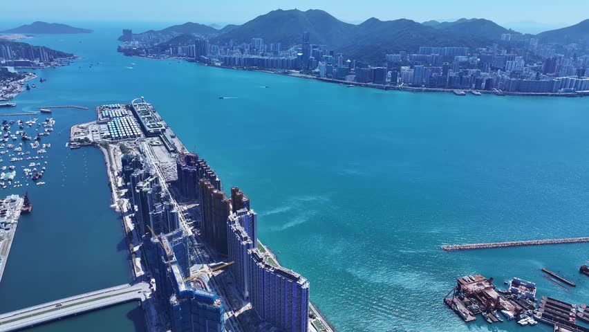 Kai Tak Construction Residential high-rise housing project along the seaside promenade near Victoria Harbour Hong Kong
