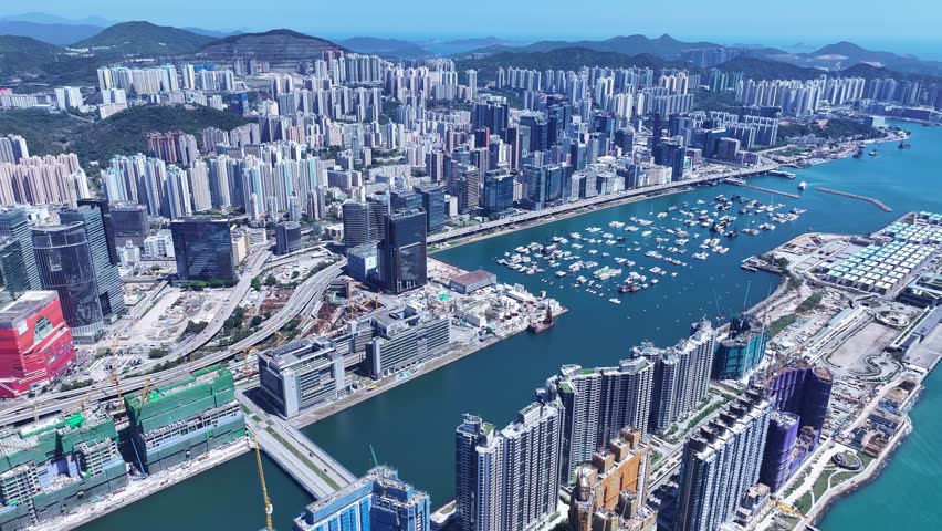 Kai Tak Construction Residential high-rise housing project along the seaside promenade near Victoria Harbour Hong Kong