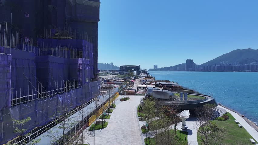 Kai Tak Construction Residential high-rise housing project along the seaside promenade near Victoria Harbour Hong Kong