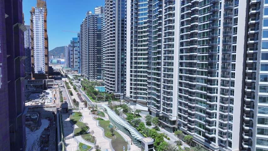 Kai Tak Construction Residential high-rise housing project along the seaside promenade near Victoria Harbour Hong Kong