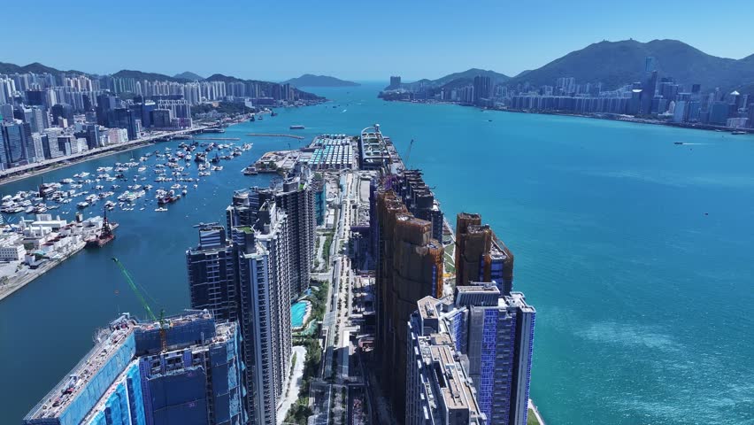 Kai Tak Construction Residential high-rise housing project along the seaside promenade near Victoria Harbour Hong Kong