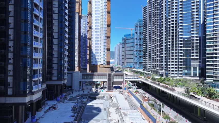 Kai Tak Construction Residential high-rise housing project along the seaside promenade near Victoria Harbour Hong Kong