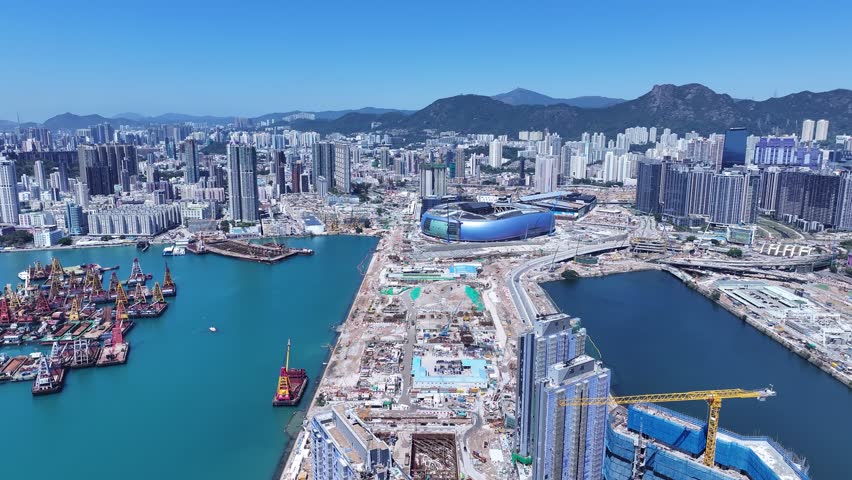Kai Tak Construction Residential high-rise housing project along the seaside promenade near Victoria Harbour Hong Kong