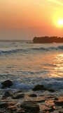 Beautiful landscape with tropical sea sunset on the beach. Vertical video