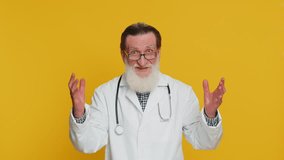 Oh my God Wow. Excited amazed winner senior doctor cardiologist man surprise looking at camera big eyes shocked by victory celebrating success. Apothecary pharmacy grandfather on yellow background - Powered by Shutterstock - Get 15% off with code: PIKWIZARD15