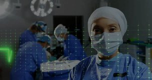 Animation of cardiograph over diverse surgeons with face masks in operating room. Global medicine and digital interface concept digitally generated video.