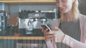 Animation of financial data processing over caucasian woman using smartphone. Global finances, computing, lifestyle and digital interface concept digitally generated video. - Powered by Shutterstock - Get 15% off with code: PIKWIZARD15