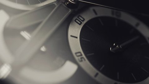 Luxury watch - macro studio shot. Beautiful stainless steel mechanical clock. Chronograph close up with second hand. Macro. 4k.