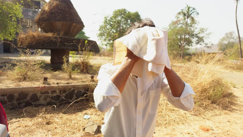 Young man standing by his car, Men drying his face using towel after face wash, Young businessman standing in rural setting, A lawyer wiping face in white shirt and black pant, Asian, Indian