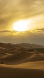 Beatiful landscape in desert at sunset, zoom out timelapse. Vertical video