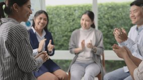 Circle diverse group asia people workshop eco go green seminar meeting class protect Future growth Net zero waste ESG unity office. Young adult asian man woman smile clap hand applaud happy team ideas - Powered by Shutterstock - Get 15% off with code: PIKWIZARD15