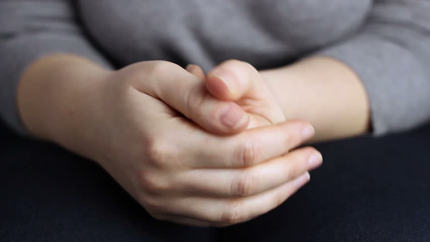 Close-up of wringing nervous woman hands. | Shutterstock HD Video #34707775