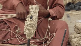 Traditional Hand Made Ropes In Pakistan. making ropes with hand for sleeping bed known as charpai in Pakistan.240fps super slow motion Footage.