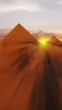 Great Giza pyramids of Khufu, Menkaure and Khafre against magical sunset, Cairo, Egypt vertical video