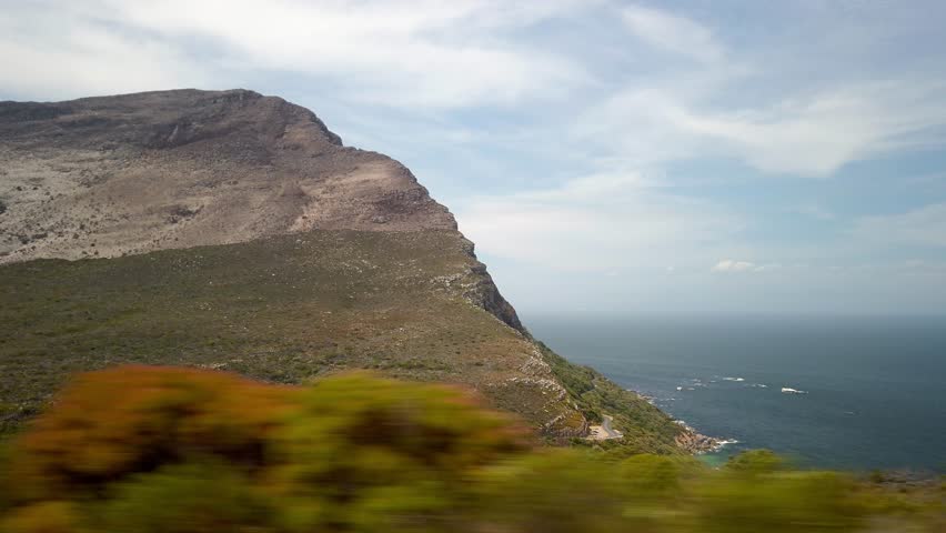 Panoramic Point of view inside car window's cape of new hope south African cliff beach landscape, skyline and environment geological formations