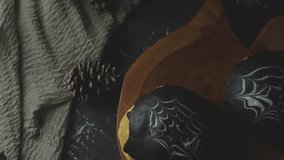 Spiderweb bread with dark chocolate. Sweet bread. decorated A white and dark chocolate. The cake is on a dark wooden table with A cup of tea. With dark background  - Powered by Shutterstock - Get 15% off with code: PIKWIZARD15