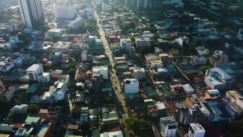 Drone circling traffic on the Radial Road 4, in sunny Manila, Philippines