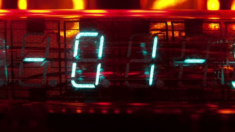a collection of led and lit-up clocks and timers in the same shot

