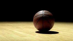 Dolly Shot of Basketball Laying on Basketball Court Floor - 4K Video