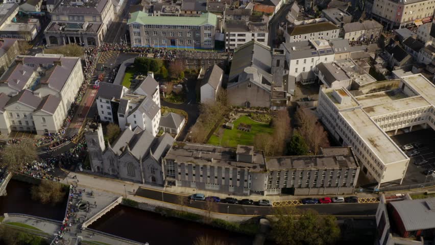 Galway parade vast aerial vista featuring the Saint Patrick parade