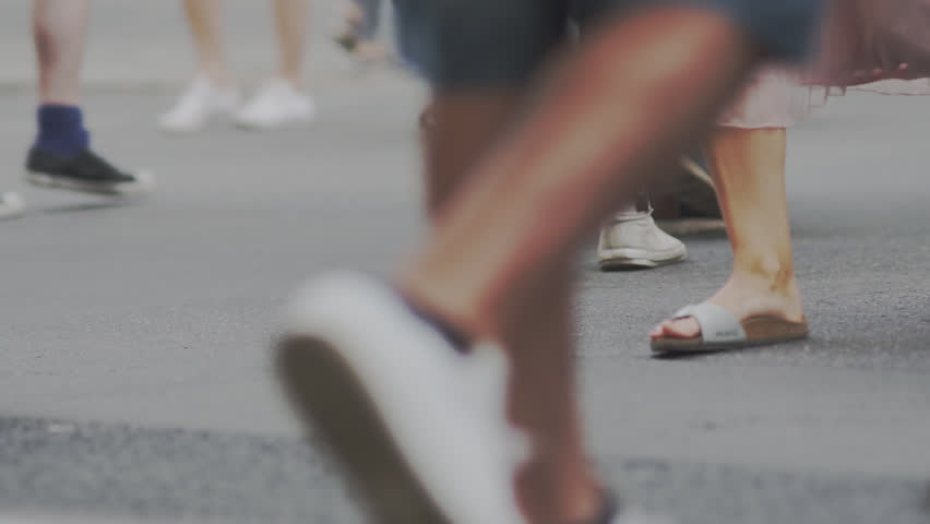 Slow Motion Shot Of People's Feet Crossing A Street In Berlin In Summer. Royalty-Free Stock Footage #34717771