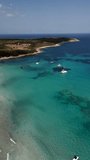 Aerial view Cala Romantica beach. Spain. Mallorca. Transparent water. Vertical video for social network. 4K
