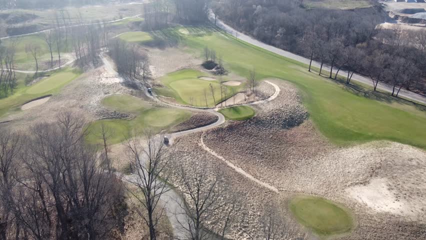 Brown brush, green fairways harmonize beautifully.