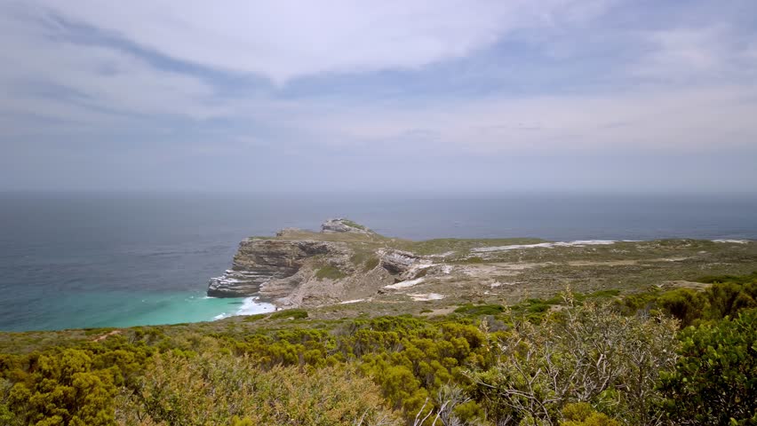Panoramic landscape of Cape Point Nature Reserve South Africa Natural Beach environment Rugged rocks and sheer cliffs